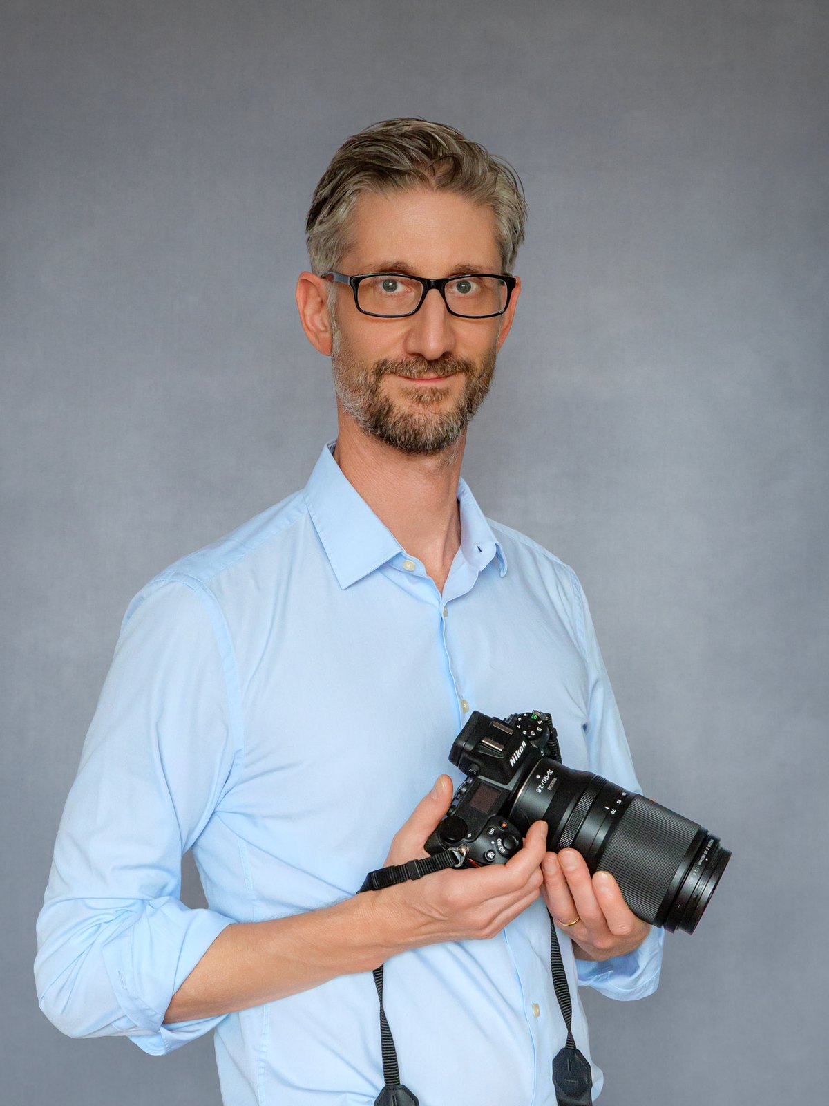 Fotograf Jan Bechberger mit Kamera